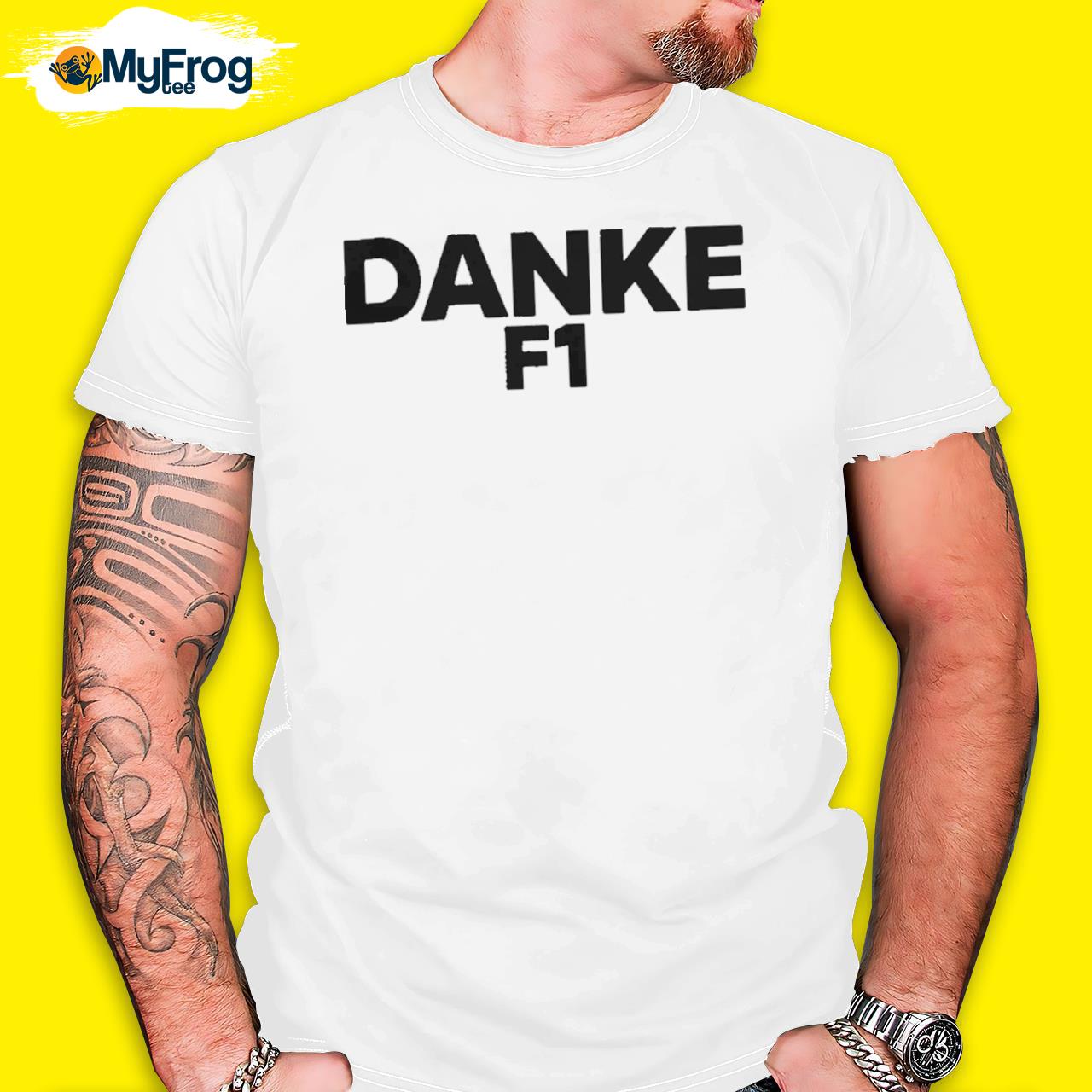 Sebastian vettel wearing danke f1 shirt