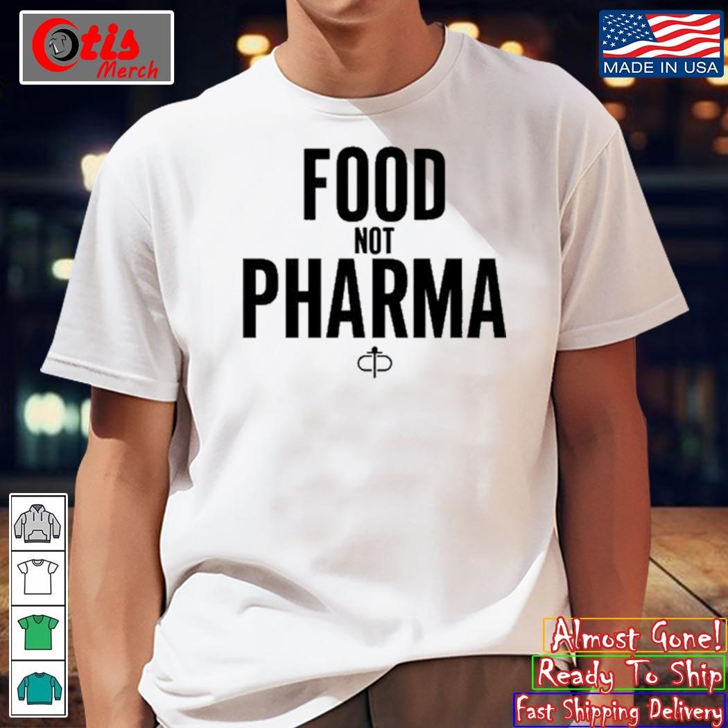 Ian Carroll Wearing Food Not Pharma Shirt